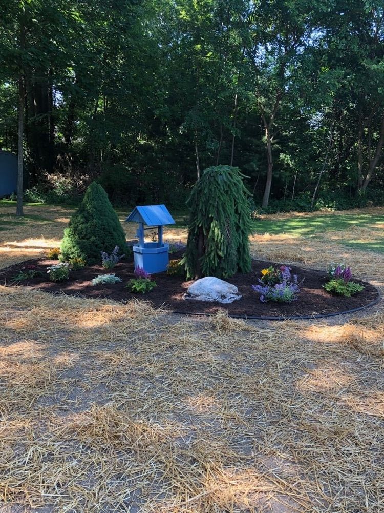 Flower beds are a great way spruce up any yard and help add some color to your property! We can custom design each bed. for Down To Business LLC in Howell, Michigan