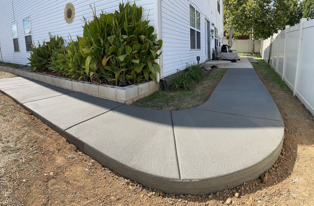Our concrete services specialize in expertly installing durable and visually appealing sidewalks, ensuring your home's exterior is both safe and aesthetically pleasing for years to come. for Premier Concrete Scapes in Murfreesboro, TN