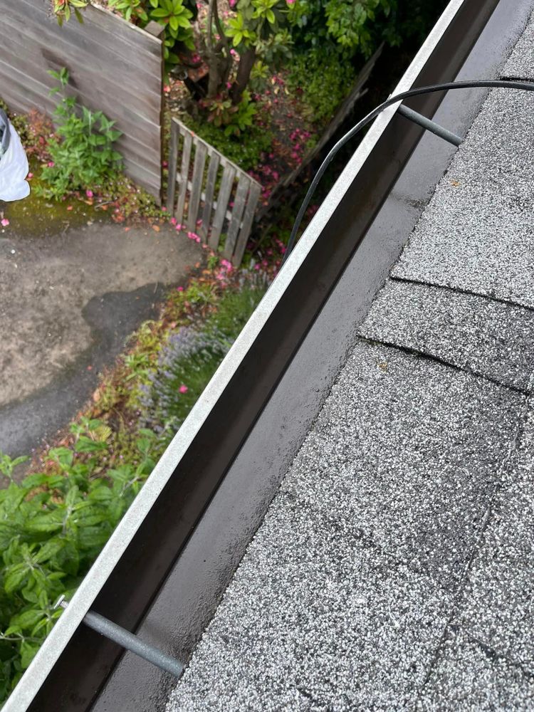 Our Gutter Cleaning service ensures your home's gutters are debris-free, preventing water damage and blockages. We carefully remove leaves and buildup to maintain proper drainage and protect your property. for Pressure Perfect in Salem, OR