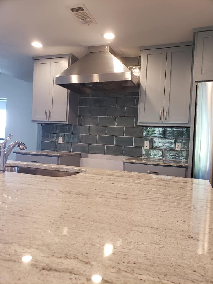 Our Kitchen and Cabinet Refinishing service will completely restore the look of your cabinets, making them look like new again. We'll remove all of the old paint or varnish, repair any damage, and then refinish them with a high-quality finish that will last for years. for Lopez Painting & Renovations in Kyle, Texas