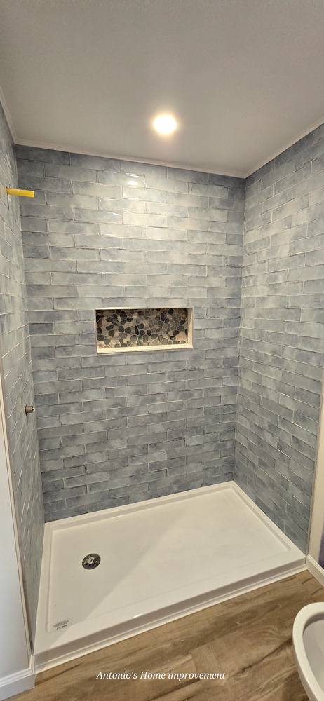 Our expert tiling service enhances your home's aesthetic with precision-installed tile, offering a wide range of styles and materials to suit any room, elevating both beauty and durability. for Antonio's Home Improvement in Utica, NY