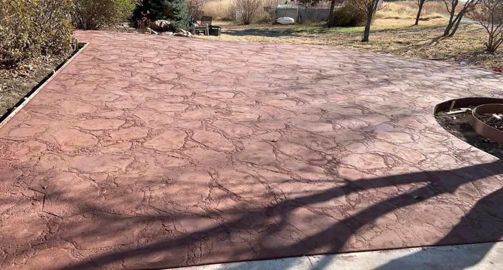 Transform your outdoor spaces with our stamped concrete installation service, offering durable and visually appealing surfaces that mimic high-end materials, enhancing the aesthetic appeal and value of your home. for Premium Concrete Construction in Topeka, KS