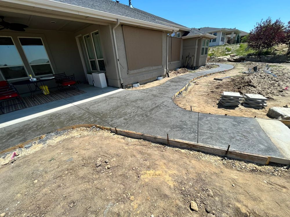 Transform your outdoor spaces with our Stamped Concrete Installation service, offering durable, stylish patterns that mimic natural materials. Enhance your home's curb appeal while ensuring longevity and low maintenance for patios, driveways, or walkways. for AMF Concrete Construction in Boise, ID
