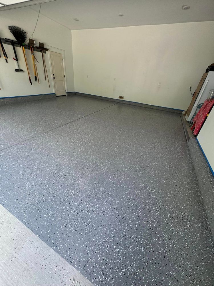 Enhance your home's durability with our epoxy floor coating service. Our expert application, including customizable vinyl flakes, provides a stylish and resilient finish that transforms any space into an attractive, long-lasting surface. for Harrison Painting & Design in Portage, IN