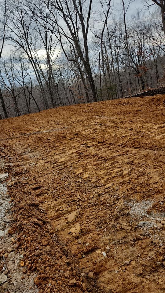 Our Land Grading service ensures a smooth, level surface for your property, improving drainage and foundation support. Trust our skilled team to prepare your land for construction or landscaping projects with precision. for Watkins Excavation in Robards, KY