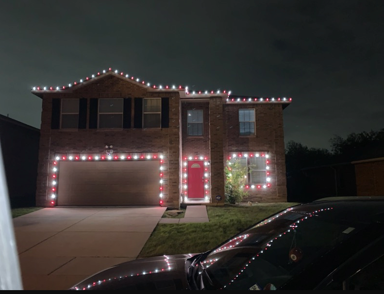 Transform your home into a winter wonderland with our Custom Christmas lights service! Let us expertly design and install festive lighting to illuminate your property and spread holiday cheer. for Teague Trees & Landscaping in Rendon, TX