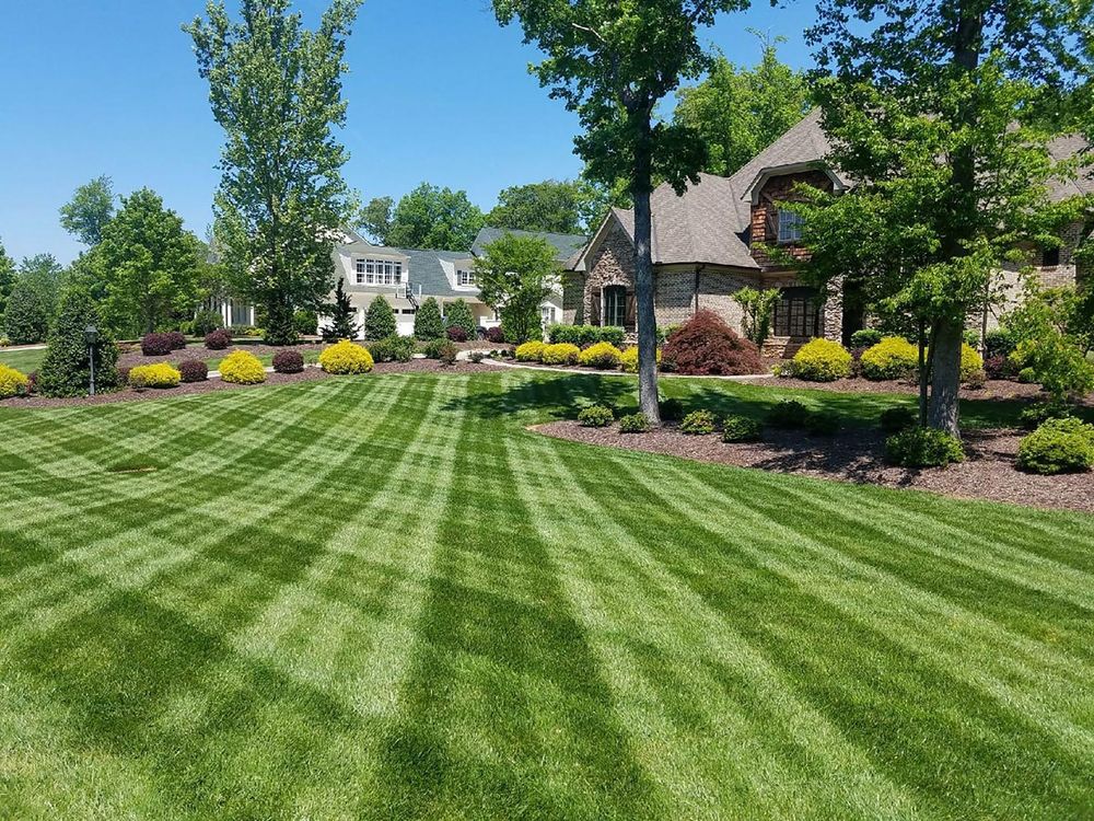 Our Monthly Mowing service ensures your lawn stays healthy and well-maintained year-round with regular visits from our experienced landscapers, providing consistent trims and care for a beautifully manicured yard. for Nate's Lawn Services in Braidwood, IL