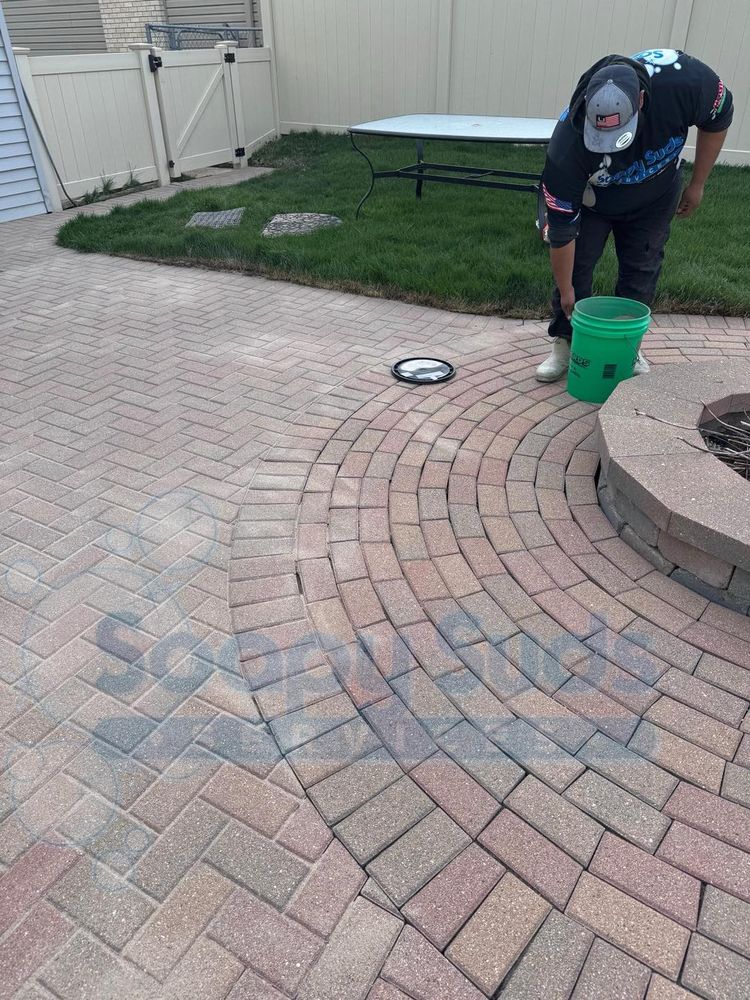 Enhance your home's curb appeal with our Concrete Sealing & Paver Brick Sand and Seal service. Following expert concrete cleaning, we protect surfaces against stains and weather damage for lasting durability. for Soapy Suds Services in St. Charles, IL