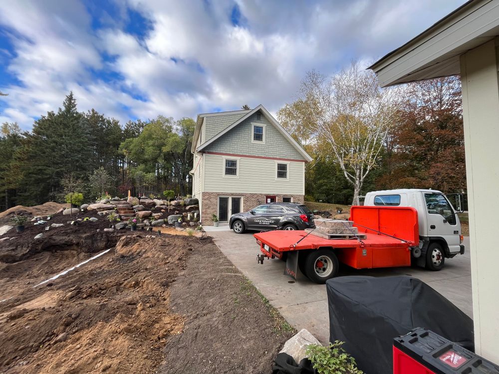 Transform your property with our expert driveway design & build service. Enhance curb appeal and functionality while adding value to your home with a custom, durable, and beautifully constructed driveway. for Jobsite Buddy in Stacy, MN