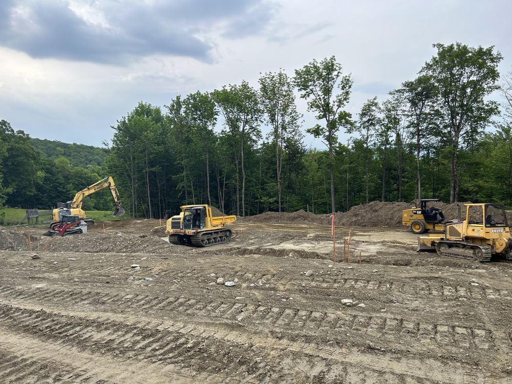 Carving a Pond into a Mountain Side for Andy Naylor Excavation in Johnson, VT