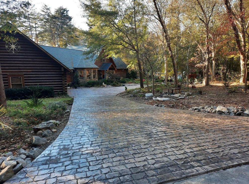 Enhance your home's aesthetic with our expert stamped concrete installation, offering durable and visually appealing patterns that mimic brick, stone, or wood for driveways, patios, and walkways. for Vanguard Concrete Creations in Winston-Salem, NC