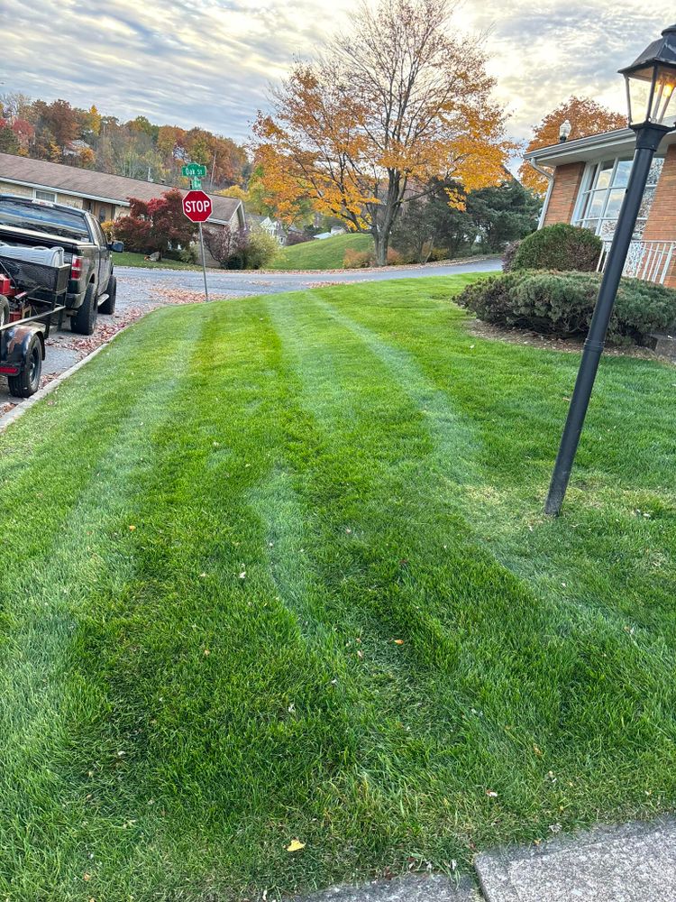 Our Lawn Aeration service improves grass health by relieving soil compaction, enhancing nutrient absorption, and boosting root growth for a lusher, more vibrant lawn ready to thrive in any season. for Bryant Property Solutions in Altoona, PA