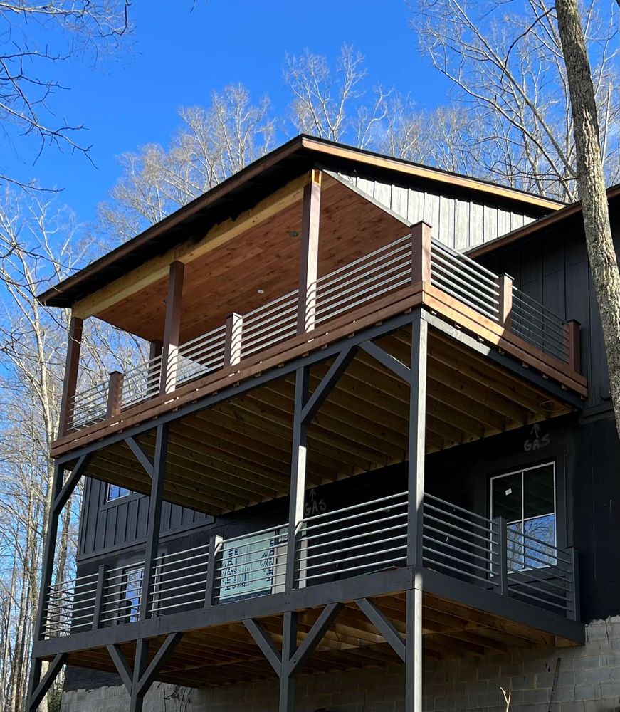 Transform your home's curb appeal with our professional Exterior Painting service. We use high-quality paints and skilled techniques to ensure a durable, beautiful finish that protects against weather elements. for Looking Glass Builders LLC in Asheville, North Carolina