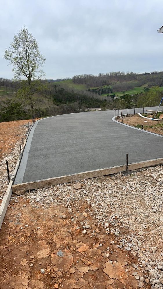 Our Concrete service provides homeowners with a durable and versatile option for creating foundations, walkways, driveways, and more on your cleared land to enhance the aesthetic appeal of your property. for Wilson Quality Construction  in New Tazewell, TN