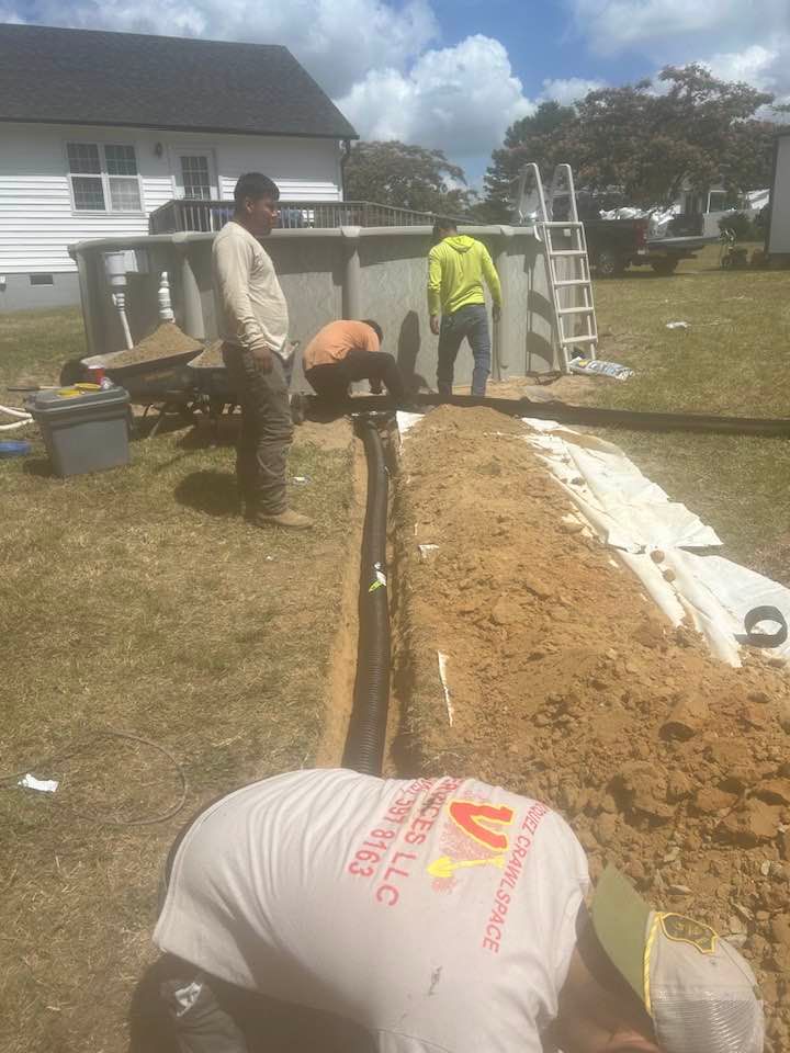 Our Drainage System Install & Repair service ensures your home's foundation stays dry and protected by expertly installing or fixing drainage solutions to prevent water accumulation and potential damage. for Vazquez Crawlspace Services LLC in Durham, NC