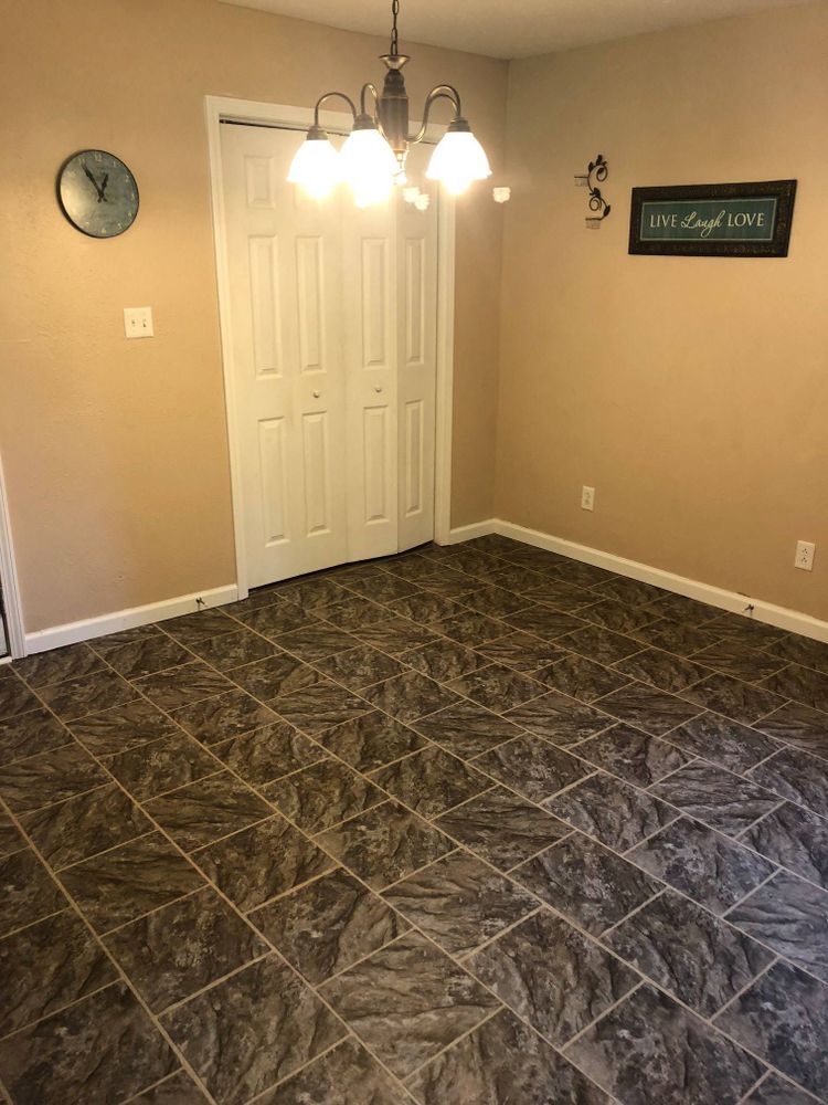 Our expert Flooring service offers high-quality materials and skilled installation to transform your home. From hardwood to tile, we help you create beautiful and durable floors that enhance your living space. for Iron Ridge Builders in Bloomfield, MO