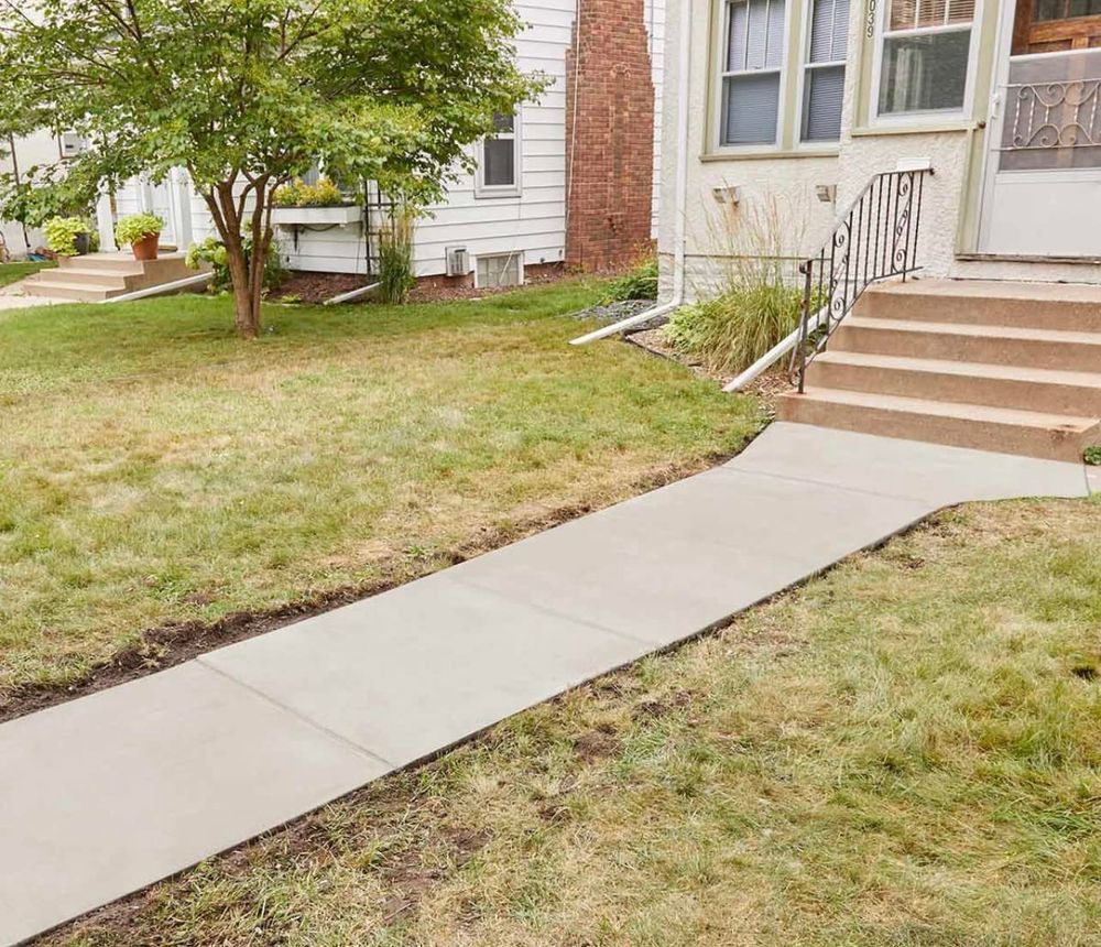 Transform your home's curb appeal with our expert concrete services, offering durable and stylish solutions for driveways, walkways, and patios that enhance both functionality and aesthetic value. for Mauldin Construction in Springfield, MO