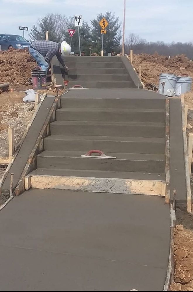 Transform your home with our expert Stair Design & Installation service, offering custom concrete solutions that blend functionality and aesthetics, enhancing both style and structure for a lasting impression. for Quintero Concrete in Christiansburg, VA