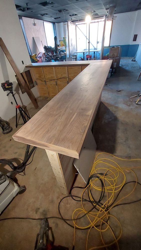 Transform your kitchen or bathroom with our Custom Countertop Design service. We offer personalized solutions, quality craftsmanship, and a variety of materials to enhance the beauty and functionality of your home. for Ossipee Mountain Construction LLC in Ossipee, NH