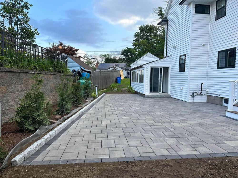 Transform your outdoor space with our expert hardscape installation services. We create durable, beautiful patios, walkways, and retaining walls that enhance both functionality and aesthetics for your home’s exterior. for Saavedra & Sons Landscaping in Waltham, MA