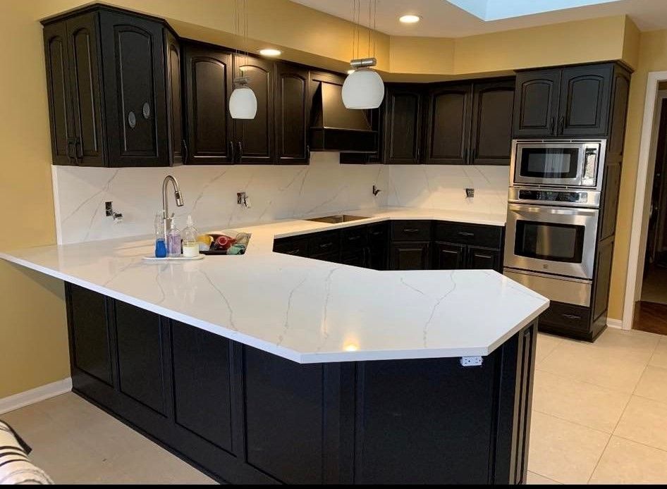 We provide professional cabinet refinishing services to give your home a beautiful, updated look without the costly replacement of cabinets. for Completely Covered Painting Co. in 
Warrenville,  IL