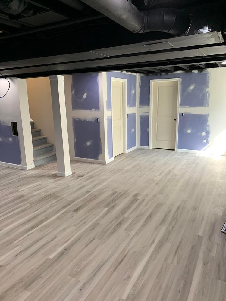 Our Finish Basement service transforms your unused space into a functional and beautiful living area. From framing to drywalling and flooring, we'll create the basement of your dreams. for Watson's Handyman Services in Genesee County, MI