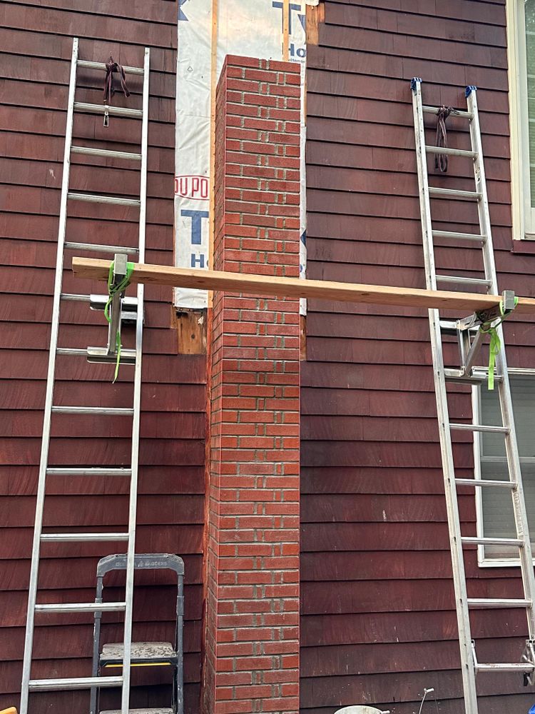 Chimney photos from restoration to new builds for All For U Roofing & Masonry in Boston, MA