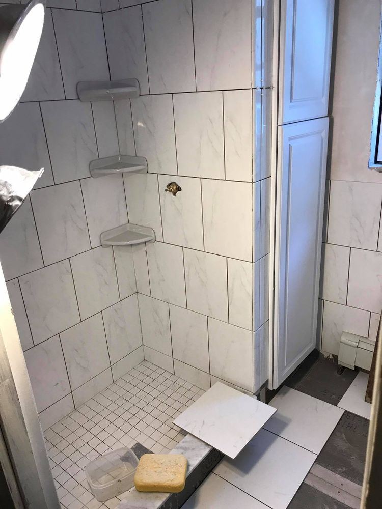 Transform your bathroom into a modern oasis with our expert renovation services, combining high-quality craftsmanship and innovative designs to create a space that perfectly suits your style and needs. for G & C Construction in Stoneham, MA