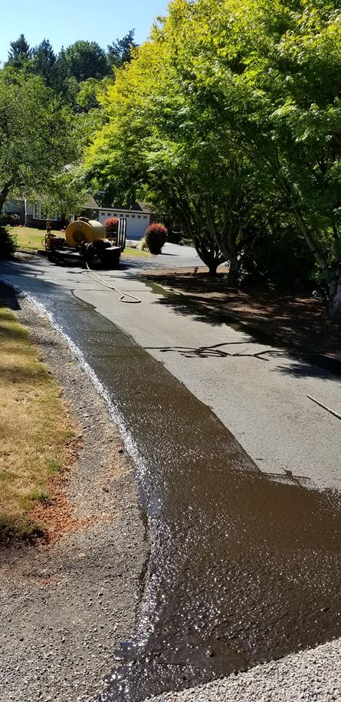 Protect and refresh your driveway with our asphalt seal coating service, designed to resist weather, UV damage, oil stains, and cracking while improving appearance and extending pavement life affordably. for Joles Construction in Newberg, OR