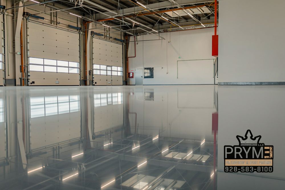 Our Industrial Epoxy Applications service delivers durable, chemical-resistant surfaces for garages, workshops, and utility spaces, helping homeowners improve function and value while understanding epoxy flooring cost for long-lasting protection. for PRYME EPOXY LLC in Mayer, AZ
