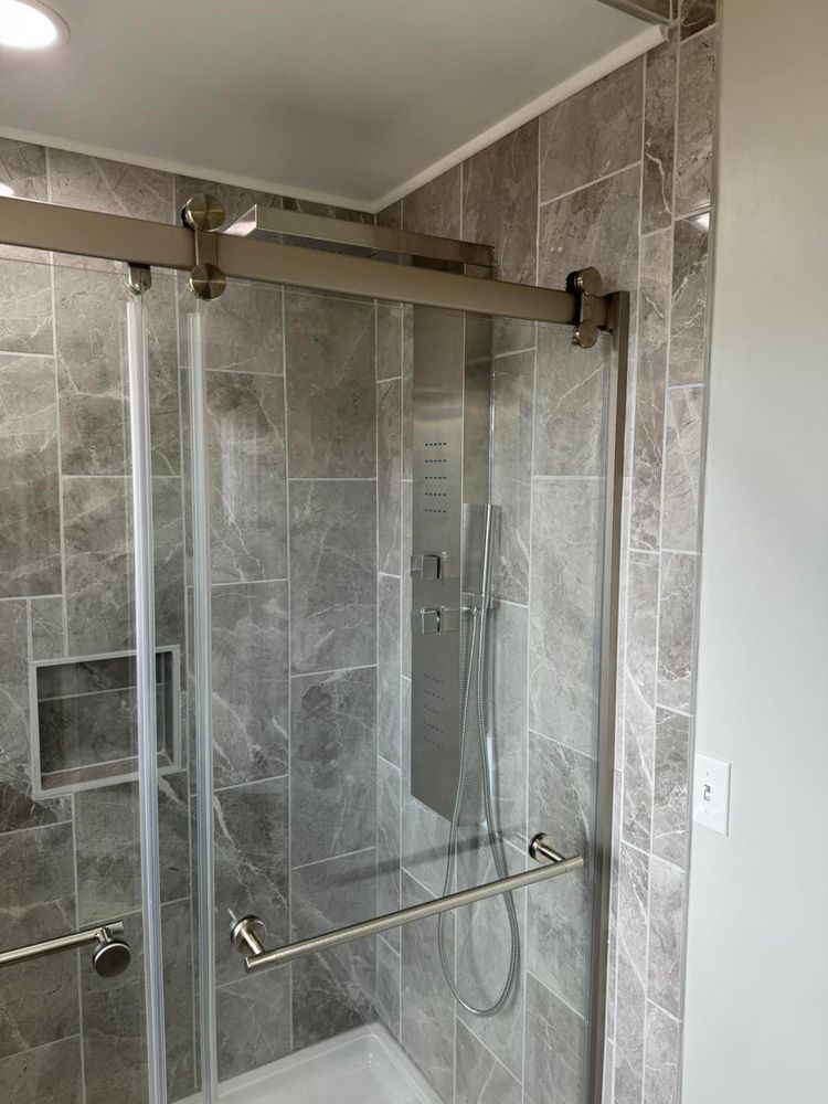 Our Bathroom Renovation service transforms your outdated or inefficient bathroom into a stylish and functional space, with options for custom designs, fixtures, and finishes to suit your needs and budget. for A Cut Above Remodels LLC  in Oakland County,  MI