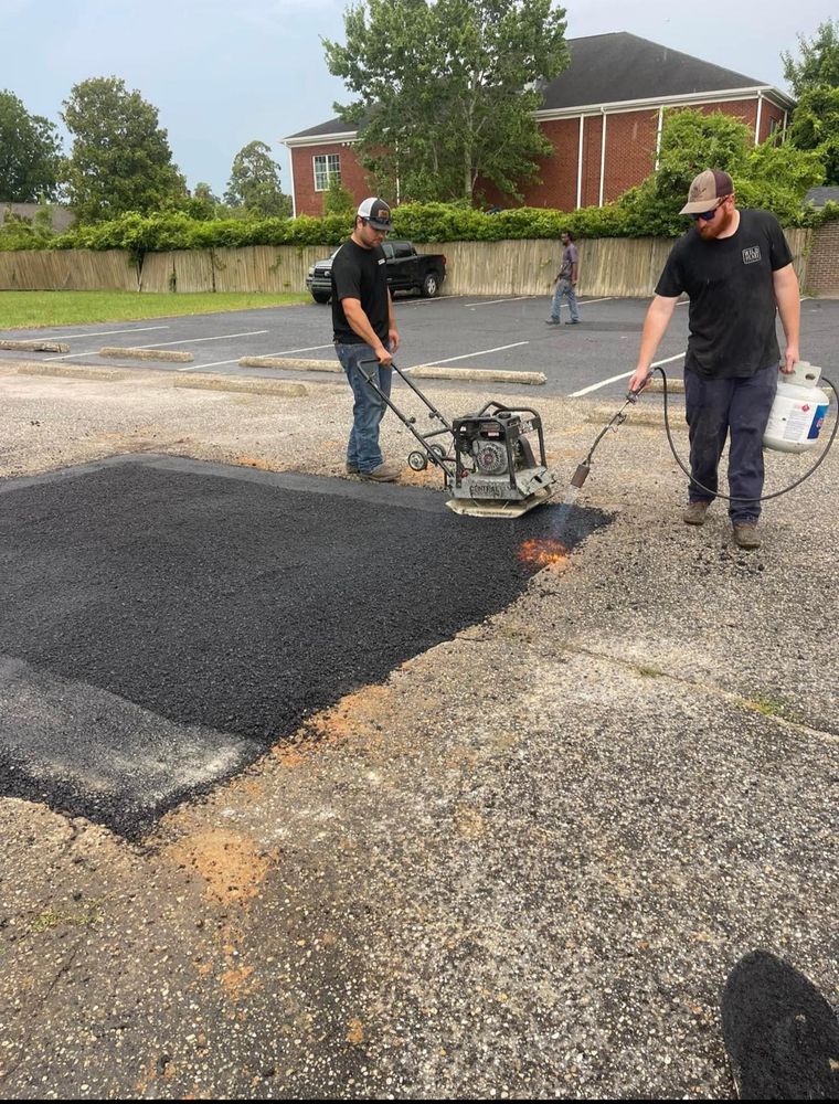 Our Patching service quickly repairs cracks and potholes in your asphalt, enhancing safety and extending its lifespan. Trust our skilled team for seamless, durable results that restore your property's curb appeal. for Blacktop Sealcoating in Hartsville, SC
