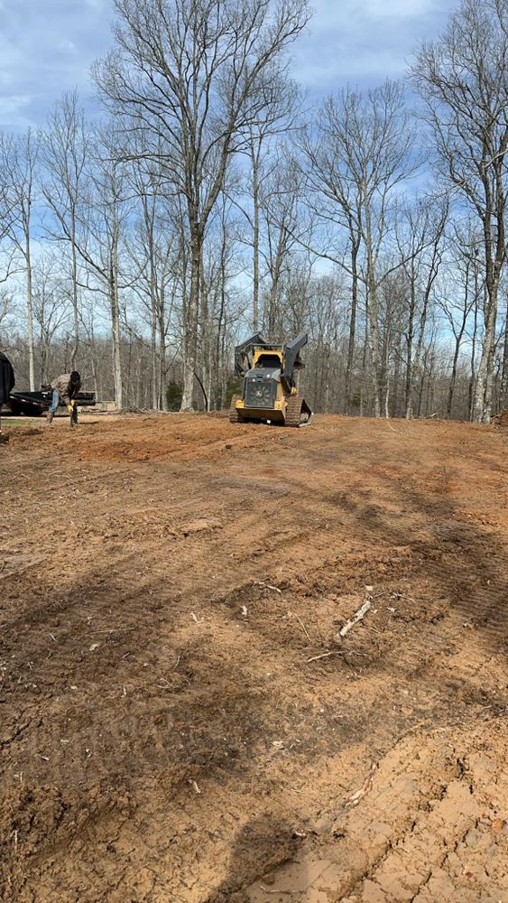 Transform your landscape with our Forestry Mulching service, which efficiently clears and revitalizes overgrown areas while preserving soil health, enhancing property aesthetics, and promoting environmental sustainability. for West TN Dirt Works in Lexington, TN