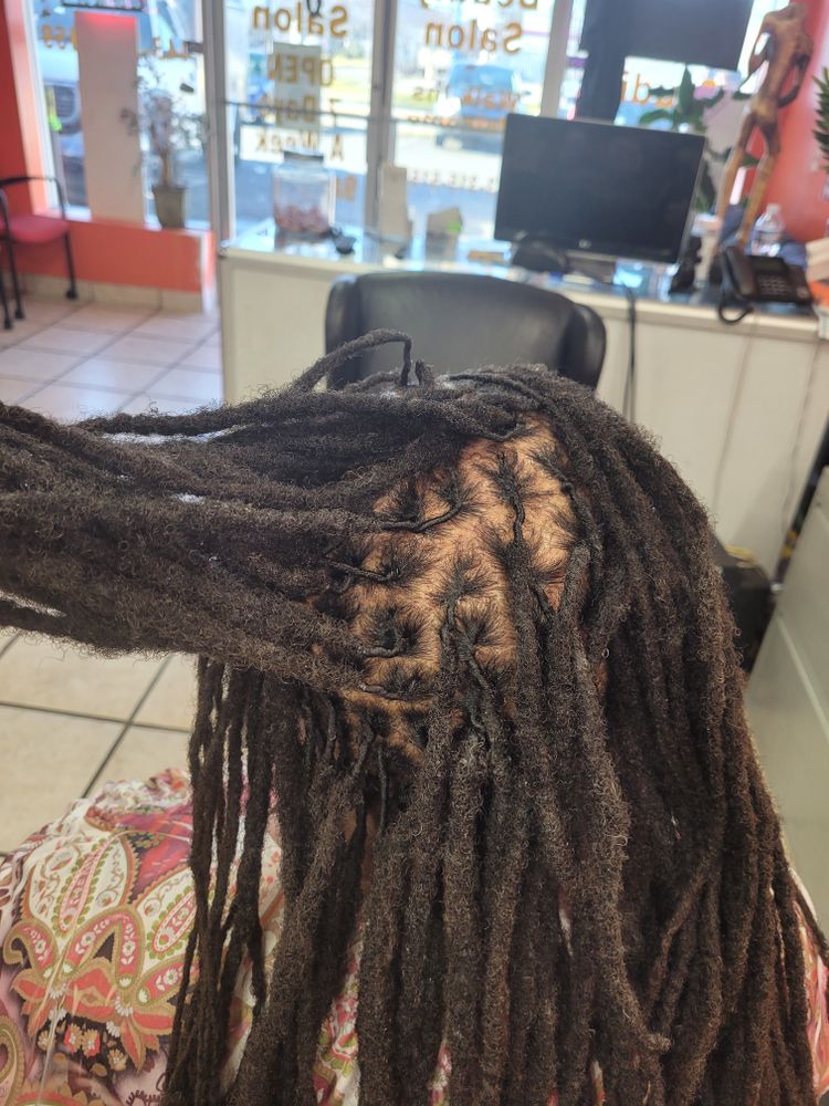 All Photos for Pascy Hair Braiding Salon & Barber Shop in Baltimore, MD