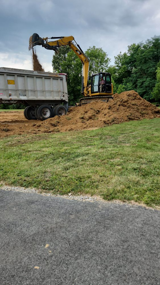 Our Skid Steer Work service efficiently handles residential projects, offering precise grading, debris removal, and landscaping to enhance your property's appearance while ensuring a seamless process with minimal disruption. for Watkins Excavation in Robards, KY