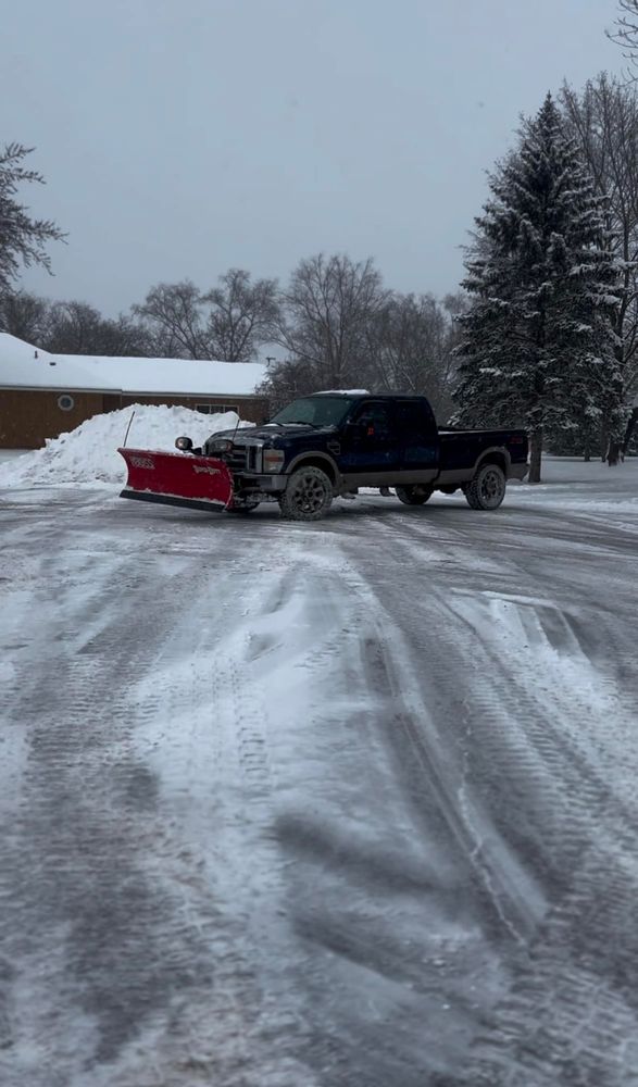 Our Snow Removal service ensures your driveways and walkways are clear and safe, using efficient equipment to promptly remove snow, enhancing accessibility during winter while protecting your property from potential damage. for JNL in Elk River, MN