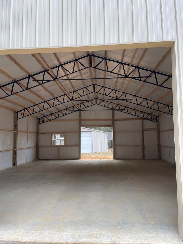 Enhance your property with our durable shed construction services, featuring high-quality steel materials. Enjoy a custom-built solution that combines functionality and strength, perfect for storage or workspace needs in any landscape. for Teague Construction in Ramer, TN