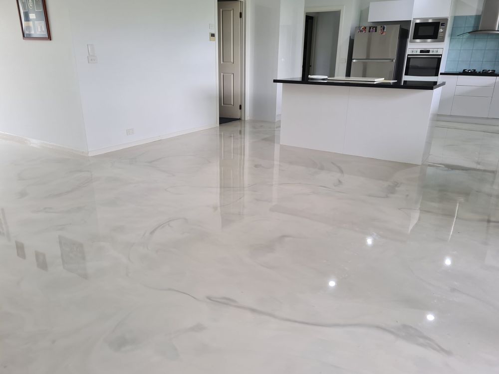 Transform your home's floors with our durable epoxy coating, offering a sleek finish that's resistant to stains and easy to clean, perfectly complementing our pressure washing and soft washing services. for AJ's Pressure Cleaning & Painting in Pembroke Pines, FL
