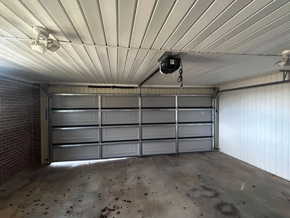 Our expert garage door repair service ensures your home's safety and convenience, offering swift diagnostics and reliable solutions to restore full functionality, all delivered with exceptional customer care by certified technicians. for Legacy Garage Doors  in Greenville, South Carolina