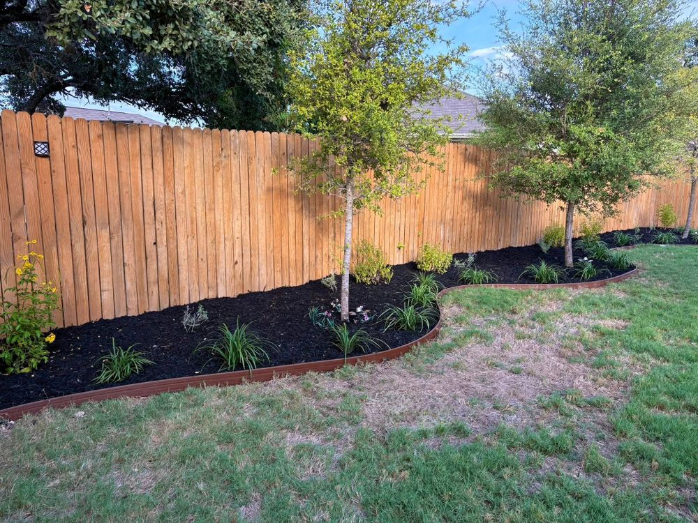 Enhance your garden's beauty and health with our professional mulch installation service, offering efficient weed control, moisture retention, and soil temperature regulation to promote vibrant plant growth and a polished landscape. for DR Landscape in San Antonio, TX