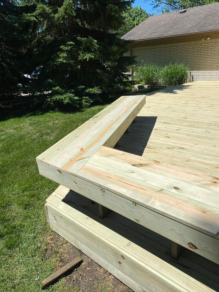 Our deck & patio installation service offers expert craftsmanship, quality materials, and personalized designs to create a beautiful outdoor living space for you and your family to enjoy for years to come. for A Cut Above Remodels LLC  in Oakland County,  MI