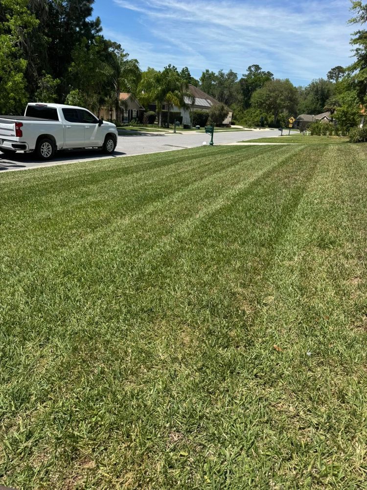 Our professional mowing service ensures a pristine, well-maintained lawn with precise cutting techniques and regular upkeep, enhancing your home's curb appeal while promoting healthy grass growth. Reliable and tailored to your schedule. for Young's Lawn Services LLC in Ocala, FL