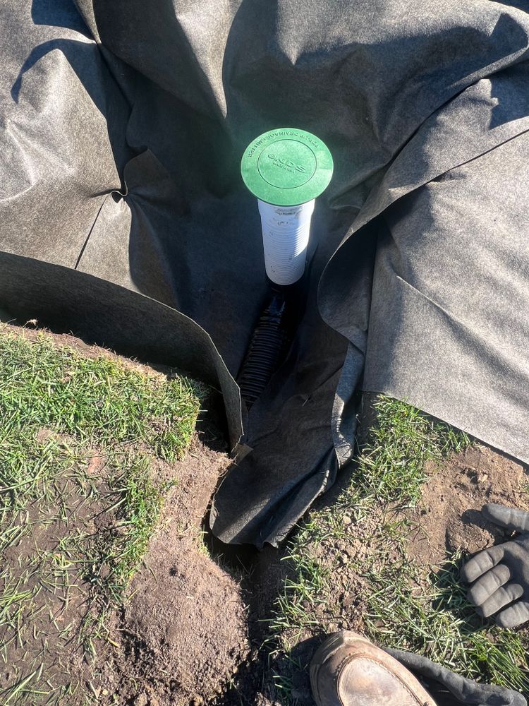 Buried downspouts for Alltimate Outdoor Services in Warren, MI