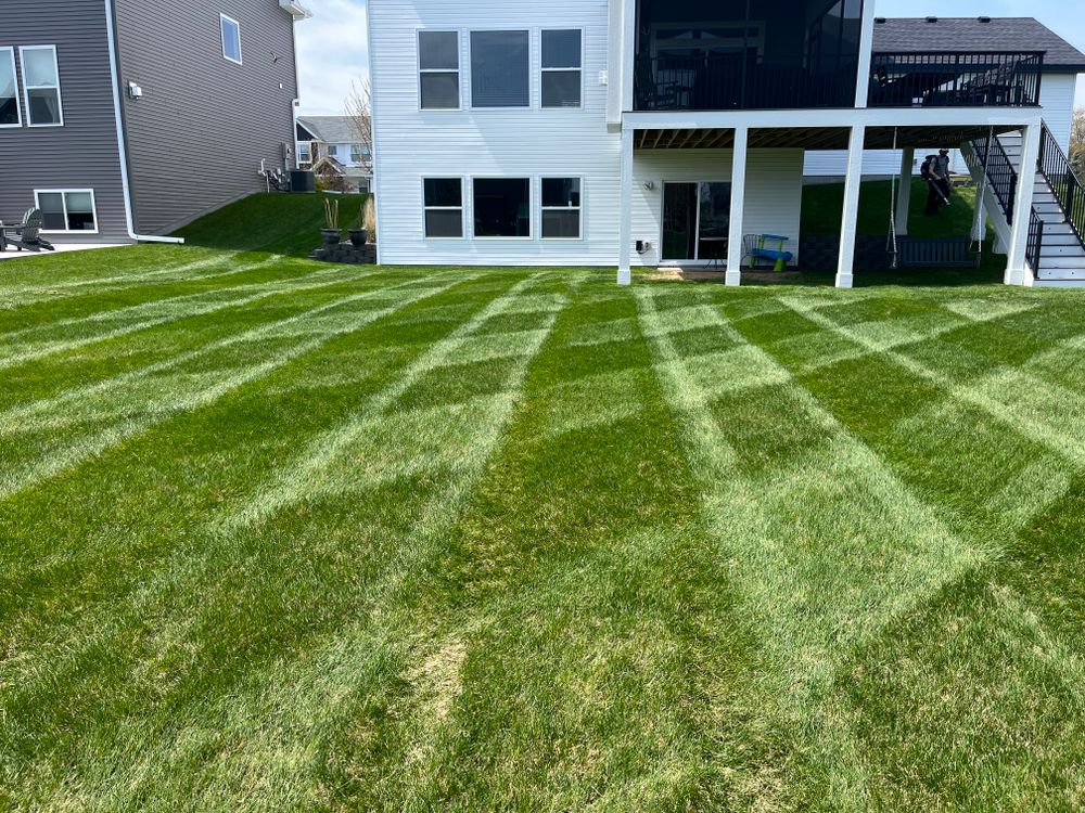 Our professional mowing service will keep your lawn looking neat and well-maintained, enhancing the overall appearance of your property and increasing curb appeal. Contact us for a quote today! for Keane Lawn Care & Snow Removal in Spring Lake Park, MN