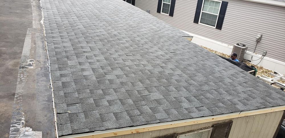 Our Roofing Replacement service provides homeowners with expert installation of new roofs using quality materials to enhance the aesthetic appeal, functionality, and protection of their homes from the elements. for Gomez Construction in Estherville,  IA