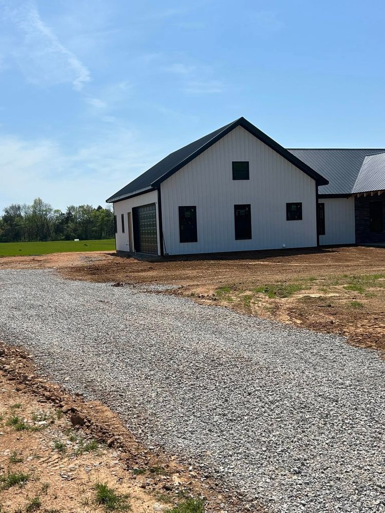 Our Roadbeds service ensures a solid foundation for your pathways, driveways, or roads by expertly preparing the ground with precision excavation and high-quality materials to enhance durability and longevity. for F&M Independent Contractors in Murfreesboro, TN