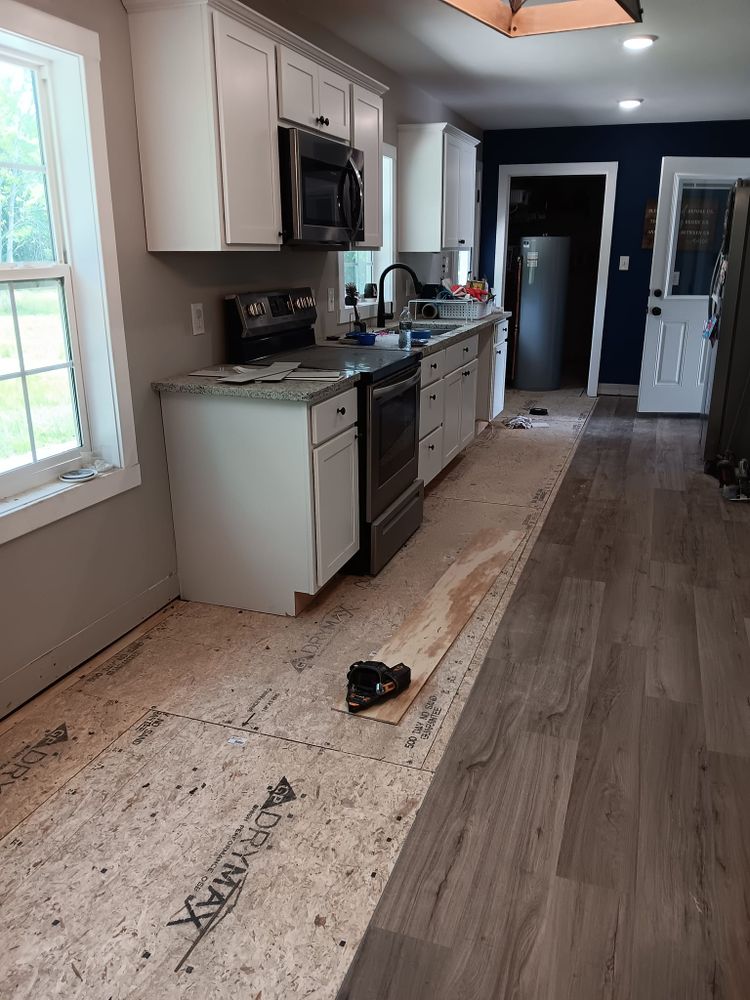 Subfloor repair and Beam Shoring for Dead Tree General Contracting in Carbondale, Illinois