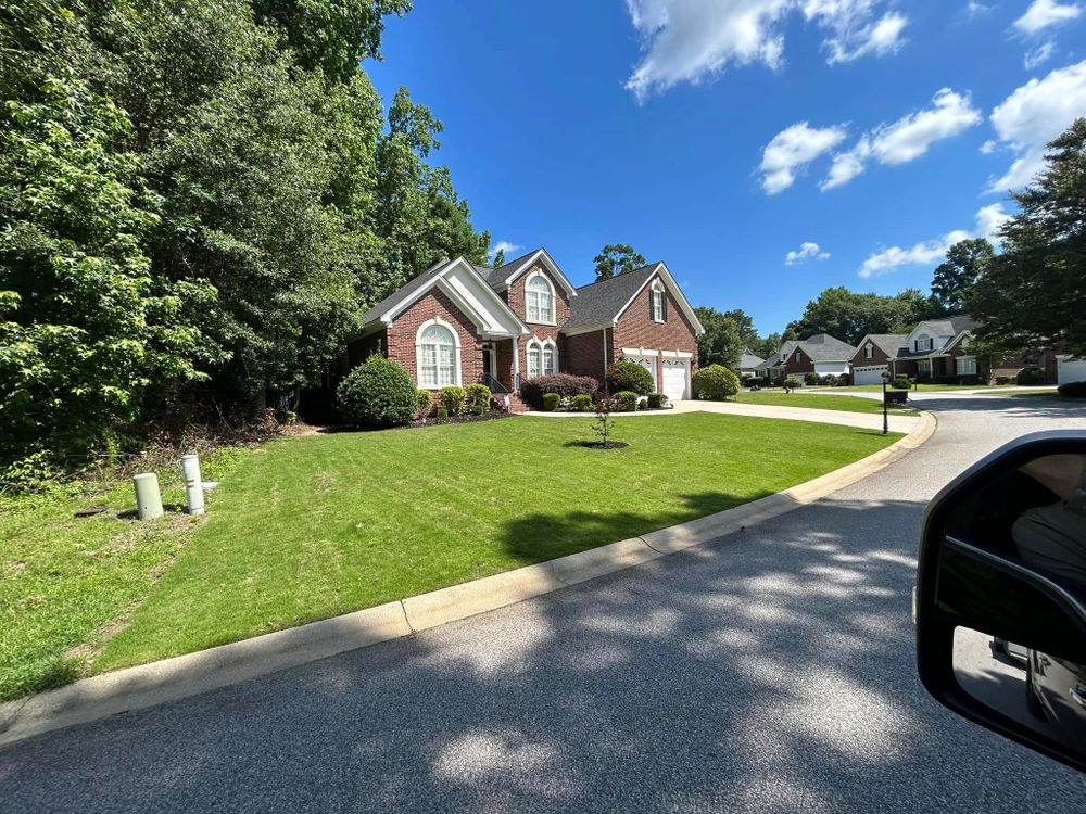 Enhance your landscape with our Irrigation System Design & Install service, ensuring efficient watering for a lush garden. Pair it with stone veneer installation to seamlessly blend natural beauty and practical elegance. for Trophy Outdoor Solutions in Lexington, SC
