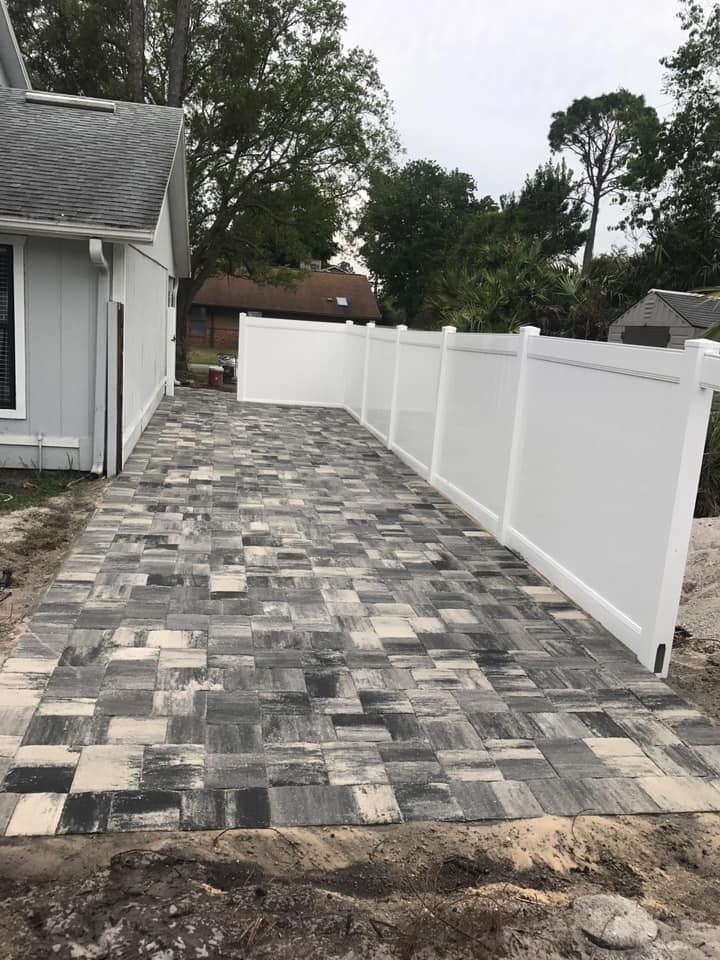 From pavers to retaining walls to a lush backyard water feature, our hardscape teams here at Cunningham Lawn & Landscape are trained professionals that love their work. Whether you need a small patio or a entire driveway, we can install it for you. Our sales team encourages our customers to be engaged in selecting style and color as well as patterns. We also do outdoor fire pits, kitchens and seat walls for more entertainment space. Let us know how we can help you! for Cunningham's Lawn & Landscaping LLC in Daytona Beach, Florida