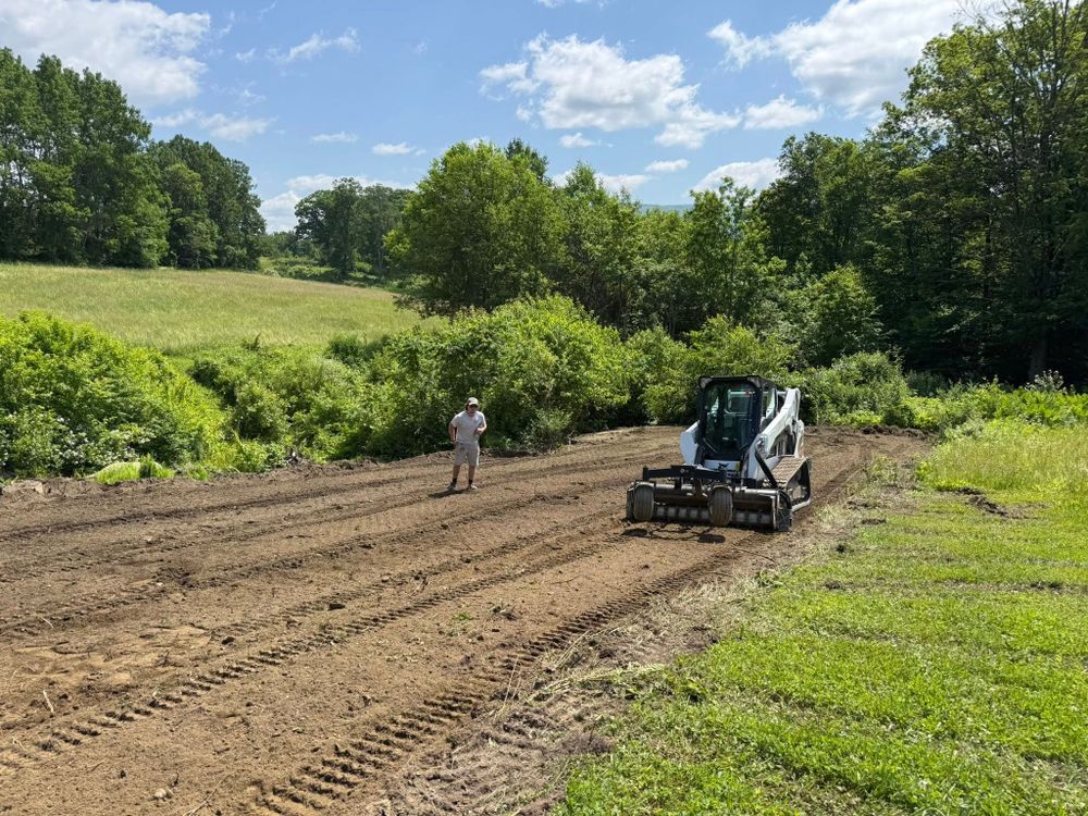 Our Land Grading service ensures a level foundation for your construction project by reshaping the land's surface to optimize drainage and stability while enhancing landscape aesthetics and protecting your property from erosion. for Jack Of All Blades in Windsor County, VT